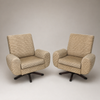 Elegante coppia di poltrone di design degli anni '60 girevoli