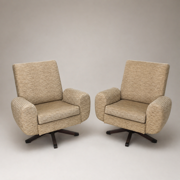 Elegante coppia di poltrone di design degli anni '60 girevoli