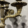 Antica coppia di candelabri in bronzo dorato