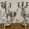 Antica coppia di candelabri in bronzo dorato