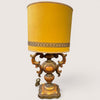Elegante lume in legno intagliato